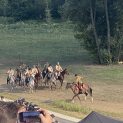 Reenactors portraying Polish Army soldiers awaiting orders from their commander before maneuvers.