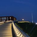 The Museum of the Battle of Warsaw 1920 in Ossów at night — a majestic silhouette beneath the full moon.